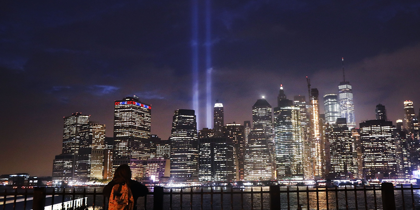 New York skyline with two beams where the twin towers would be